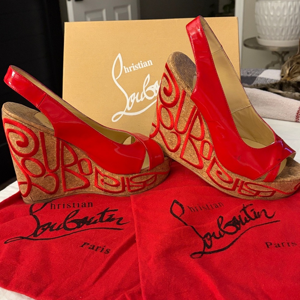 Christian Louboutin Marpop Wedges
Size 39
Red Patent Leather with Cork Wedge